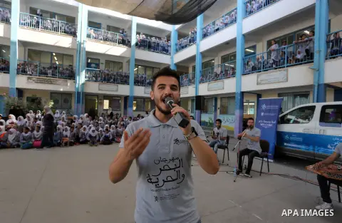 Palestinian students attend the Sea and Freedom Festival, at their school run by the United Nations Relief and Works Agency (UNRWA), in Beit Hanoun in the northern Gaza Strip, on September 26, 2019. Photo by Ashraf Amra