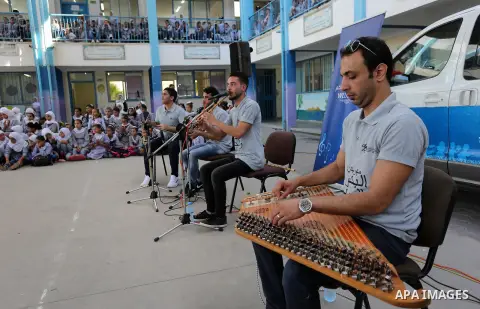 Palestinian students attend the Sea and Freedom Festival, at their school run by the United Nations Relief and Works Agency (UNRWA), in Beit Hanoun in the northern Gaza Strip, on September 26, 2019. Photo by Ashraf Amra