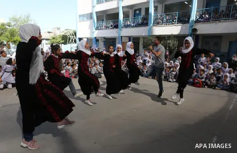 Palestinian students attend the Sea and Freedom Festival, at their school run by the United Nations Relief and Works Agency (UNRWA), in Beit Hanoun in the northern Gaza Strip, on September 26, 2019. Photo by Ashraf Amra