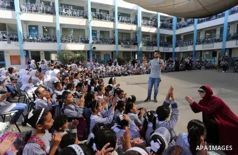 Palestinian students attend the Sea and Freedom Festival, at their school run by the United Nations Relief and Works Agency (UNRWA), in Beit Hanoun in the northern Gaza Strip, on September 26, 2019. Photo by Ashraf Amra