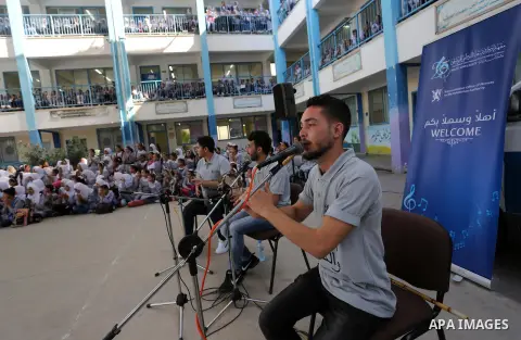 Palestinian students attend the Sea and Freedom Festival, at their school run by the United Nations Relief and Works Agency (UNRWA), in Beit Hanoun in the northern Gaza Strip, on September 26, 2019. Photo by Ashraf Amra