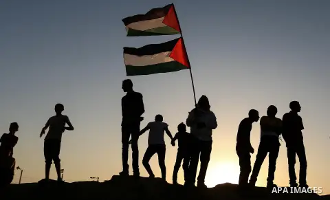 Palestinian protesters clash with Israeli troops following the tents protest where Palestinians demand the right to return to their homeland at the Israel-Gaza border, in Khan Younis in the southern Gaza Strip, Spetember...