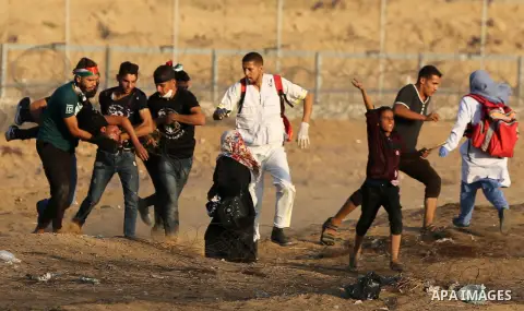 A wounded Palestinian protester is evacuated during clashes with Israeli troops following the tents protest where Palestinians demand the right to return to their homeland at the Israel-Gaza border, in Khan Younis in the...
