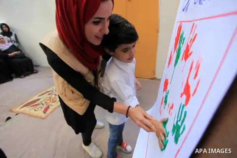 Palestinian children who are autistic paly during an entertainment day, in Gaza city, on September 28, 2019. Autism is a developmental disorder characterized by difficulties with social interaction and communication. Pho...
