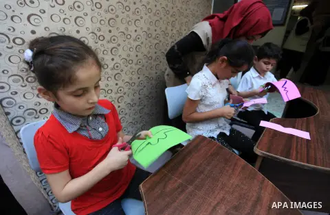 Palestinian children who are autistic paly during an entertainment day, in Gaza city, on September 28, 2019. Autism is a developmental disorder characterized by difficulties with social interaction and communication. Pho...