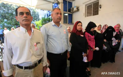 Palestinians take part in the Breast Cancer Awareness campaign, in Gaza City on October 3, 2019. Photo by Mahmoud Ajjour
