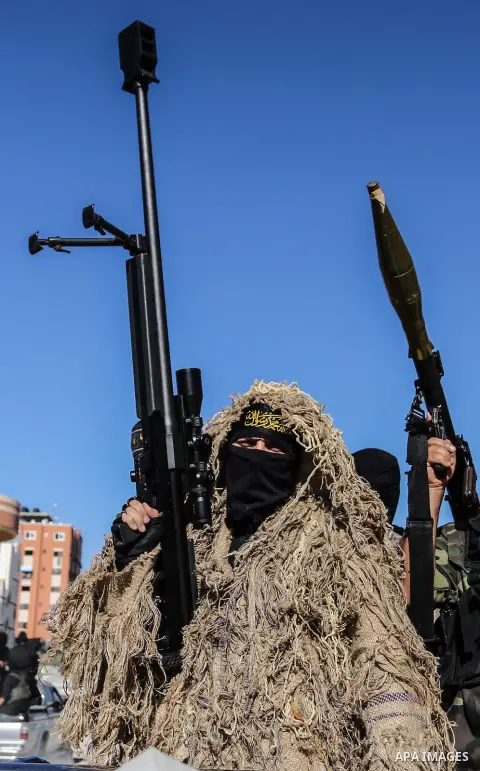 Palestinian militants of Islamic Jihad Movement, take part during a military parade in Gaza city on October 3, 2019. Photo by Ashraf Amra