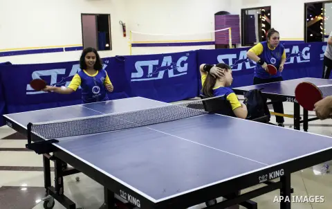 Palestinian children take part in a table tennis training session in Gaza City, on October 6, 2019. Photo by Mahmoud Ajjour