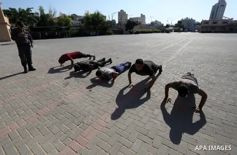 Palestinian applicants undergo a physical examination at a recruitment centre run by the Ministry of Interior and National Security, in Gaza City, on October 7, 2019. 1000 recruits from 13607 applicants aged between 18 t...