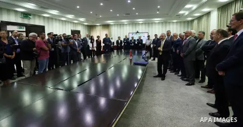 Palestinian Prime Minister Mohammad Ishtayeh signs a contract for the implementation of infrastructure works for the project "Jenin Free Industrial Zone" in the West Bank city of Ramallah, on October 17, 2019. Photo by P...
