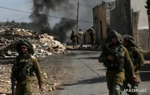 Israeli forces arrest Spanish activist during clashes with Palestinian protesters following a weekly demonstration against the expropriation of Palestinian land by Israel in the village of Kfar Qaddum, near the West Bank...