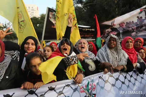 Palestinian Fatah supporters take part in a rally to mark the 15th anniversary of the death of late Palestinian leader Yasser Arafat in Gaza city on November 09, 2019. Photo by Ashraf Amra