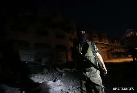 Palestinians inspect the damaged house of Islamic Jihad leader Baha Abu Al-Ata afther an Israeli attack in Gaza city, on November 12, 2019. and residents said, with the enclave's health ministry reporting that two people...