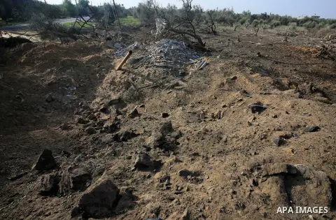 A Palestinian man inspects a poultry farm destroyed in an Israeli airstrike in Khan Younis southern of Gaza Strip, on November 13, 2019. Photo by Ramadan el-agha