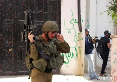 Israeli security forces take position during clashes with Palestinian protesters following at al-Arrub refugee camp, north of Hebron in the southern West Bank on November 13, 2019. Photo by Mosab Shawer