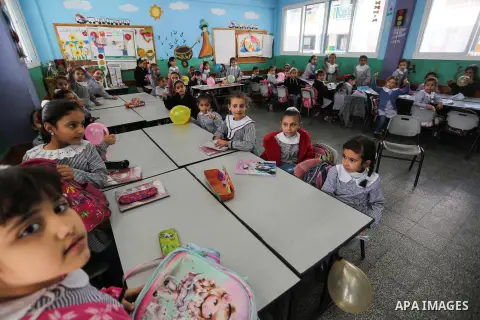 Palestinian students play during an entertaining day at their school run by the United Nations Relief and Works Agency (UNRWA), in Gaza city, on November 18, 2019. Matthias Schmale, director of UNRWA operations in Gaza,...