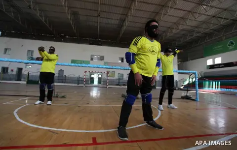 Palestinian players play bell ball for the blind, in Gaza city, on November 21, 2019. Photo by Mahmoud Ajjour