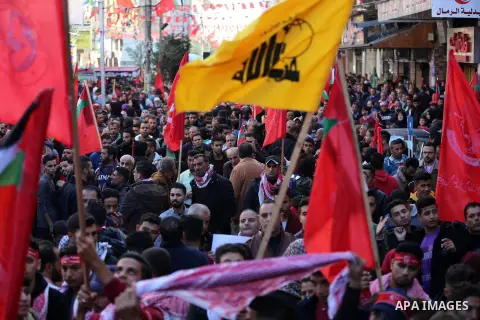 Palestinian supporters of the Popular Front for the Liberation of Palestine (PFLP) take part during a rally marking the 52nd anniversary of the founding of (PFLP) in Gaza City on December 7, 2019. Photo by Ashraf Amra