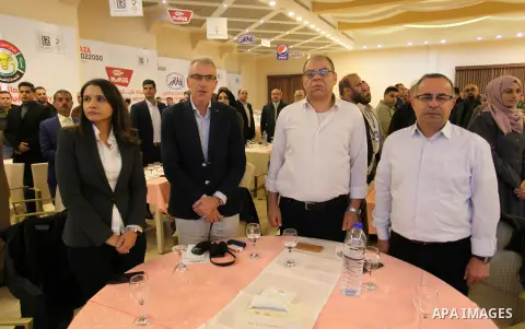 Palestinians attend a ceremony honoring companies holding ISO22000 certificates, in Gaza city on December 11, 2019. Photo by Mahmoud Ajjour