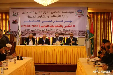 Palestinians attend the 13th Jerusalem Scientific Conference, in Gaza city, on December 18, 2019. Photo by Ashraf Amra