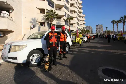 Qatar's Ambassador to the Palestinian Authority, Mohammed Al Emadi attends a ceremony to delivery vehicles and equipments with a donation from the State of Qatar for the benefit of the Palestinian Fire and Civil Defense...