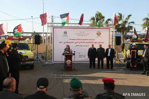 Qatar's Ambassador to the Palestinian Authority, Mohammed Al Emadi attends a ceremony to delivery vehicles and equipments with a donation from the State of Qatar for the benefit of the Palestinian Fire and Civil Defense...