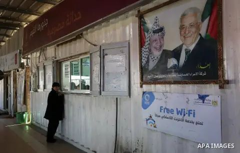 Palestinian Christian families leave Gaza to enter Israel through the Erez border crossing to attend Christmas celebrations in Bethlehem, in the northern Gaza Strip, on December 24, 2019. This year, Israel granted around...
