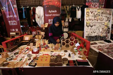 Palestinians attend the opening of the 14th annual exhibition entitled "Women’s Products" in Gaza City, on December 30 2019. Photo by Ashraf Amra