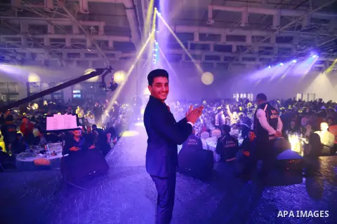 A picture taken on December 31, 2019 shows Palestinian singer Mohammed Assaf performs during new Year's party in Istanbul, Turkey. Photo by Shady Alassar