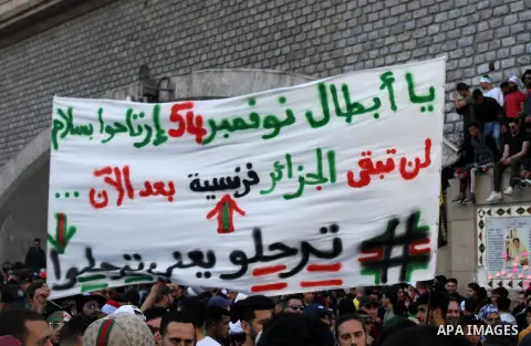 Algerian protesters march in an anti-government demonstration in the capital Algiers on March 15, 2019. Photo by Taher Boussoualim