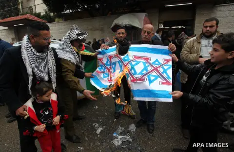 Palestinians take part in a protest in solidarity with prisoners in Israeli jails, in front of the Red cross office, in Gaza city on January 23, 2020. Photo by Mahmoud Ajjour