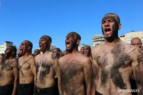 Palestinian students show off their military skills during a c at a police academy, in Gaza City January 30, 2020. Photo by Ashraf Amra