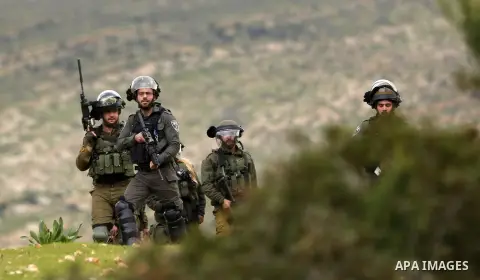 Israeli soldiers fire tear gas canisters towards Palestinian demonstrators during a protest against Israeli settlements and the US President Donald Trump's Century Deal "expected peace plan", in the West Bank city of Tub...