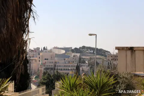 A picture shows a side of the Israeli separation wall arround Jerusalem in Jerusalem's Old city,on March 8, 2020. In June 2002, the Israeli cabinet decided to construct the separation wall. The decision was made followin...