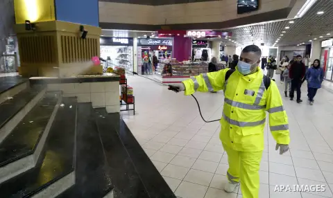 A Palestinian worker disinfects a mall, as a preventive measure amid fears of the spread of the novel coronavirus, in the West Bank city of Nablus, on March 9, 2020. Photo by Shadi Jarar'ah