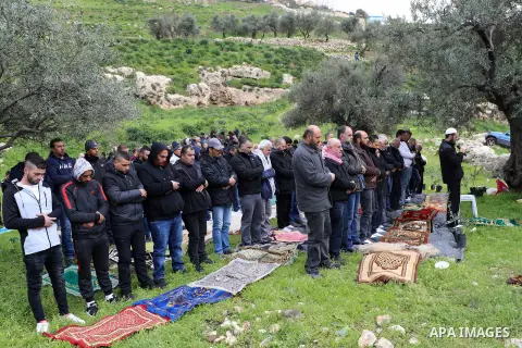 Palestinian worshipers attend Friday prayers in the Valley of Rababa in Jerusalem, on March 13, 2020. The Israeli occupation seeks to seize the entire 60-dunam area of Silwan, known as Wadi al-Rababa, to turn it into a p...