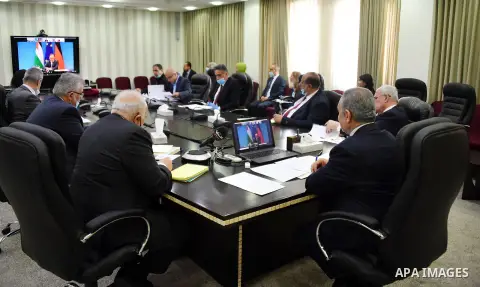Palestinian Prime Minister Mohammad Ishtayeh, attends the German-Palestinian Ministerial Steering Committee meeting via a video link, in the West Bank city of Ramallah, on May 19, 2020. Photo by Prime Minister Office