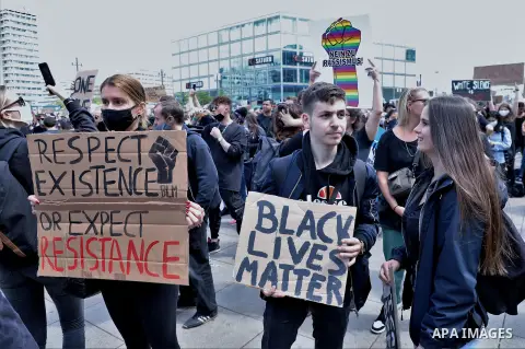 People gather take part in a protest against the recent killing of George Floyd by police officers in Minneapolis, USA, at the Alexander Platz in Berlin, Germany, on June 6, 2020. That has led to protests in many countri...