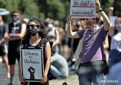 People gather take part in a protest against racial inequality, in Berlin, Germany, on June 27, 2020. Photo by Manar Shahin