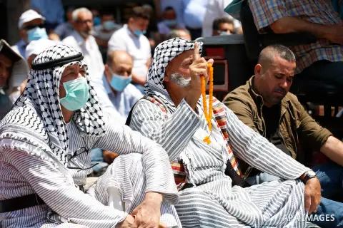 Palestinians take part in a protest against the United Arab Emirates' deal with Israel to normalise relations, in the West Bank city of Nablus on August 14, 2020, against a US-brokered deal between Israel and the UAE to...