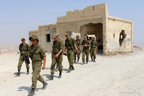 Israeli soldiers walk during a military trainingin, in Yatta village in the southern West bank district of Hebron on September 16, 2020. Photo by Mosab Shawer
