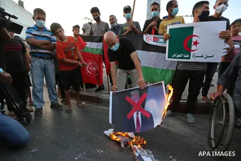 Palestinian protesters take part in a protest to denounce the Israeli normalisation deals with the United Arab Emirates and Bahrain, in Khan Yunis in the southern Gaza Strip on September 23, 2020. Photo by Ashraf Amra