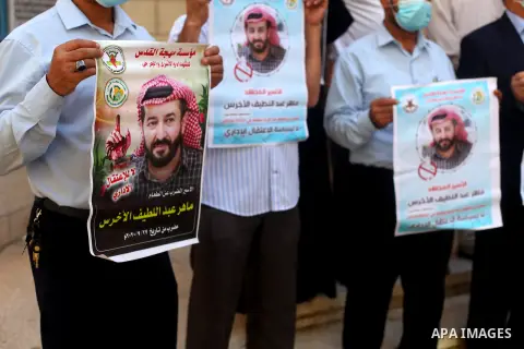 Palestinians take part in a protest in solidarity with prisoner Maher Al-Akhras, on hunger strike, in Israeli jails, in Gaza city, on October 8, 2020. Photo by Mahmoud Ajjour