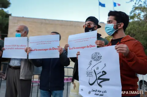 Palestinian lawyers and activists, take part in a protest against the French incitement against the Islamic religion and the Holy Prophet Muhammad, in front of the French Consulate in Jerusalem, on November 2, 2020. Phot...