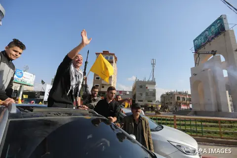 Freed Palestinian prisoner Abdel-Raouf Qe'dan, is recieved by relatives upon arrival in Rafah in the southern Gaza Strip on November 6, 2020. Qe'dan was released after serving a 16-year-sentence in an Israeli jail. Photo...