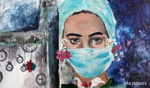 Palestinian artists attend an exhibition entitled " Corona and the art " organized by the Arts & Crafts Village, a centre that helps promote artists and their work in an attempt to maintain and preserve the Palestinian h...