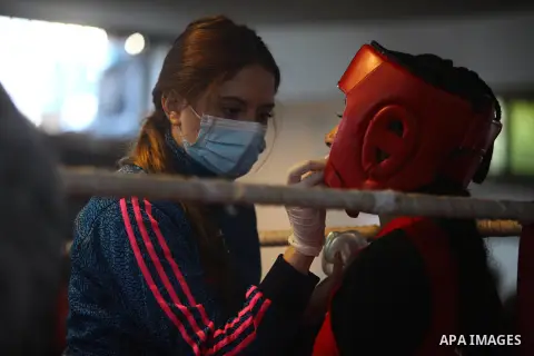 Palestinian Girl boxers play boxing during the first women's tournament inside a ring in a gymnasium in Gaza City, on November 20, 2020. Photo by Mahmoud Ajjour