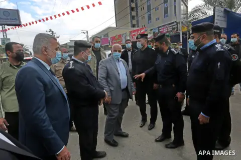 Undersecretary of the Palestinian Ministry of the Interior and director general of the internal security forces, Tawfiq Abu Naim and Head of Governmental Work Follow-up Dr. Mohamed Awad, during an inspection tour as a pr...