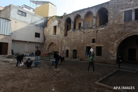 Palestinian volunteers renovate and cleen the Kemaliya Archaeological School in Gaza City, on January. 7, 2021. The Kemaliya Archaeological School which dates back to 800 AD. Palestinian youth participated in an initiati...