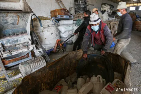 Palestinian workers reuses plastic to produce water hoses and toys for childrenat a factory, in Khan Younis in the southern Gaza Strip on January 18, 2021. According to the most recent November UNCTAD report (2020), Gaza...
